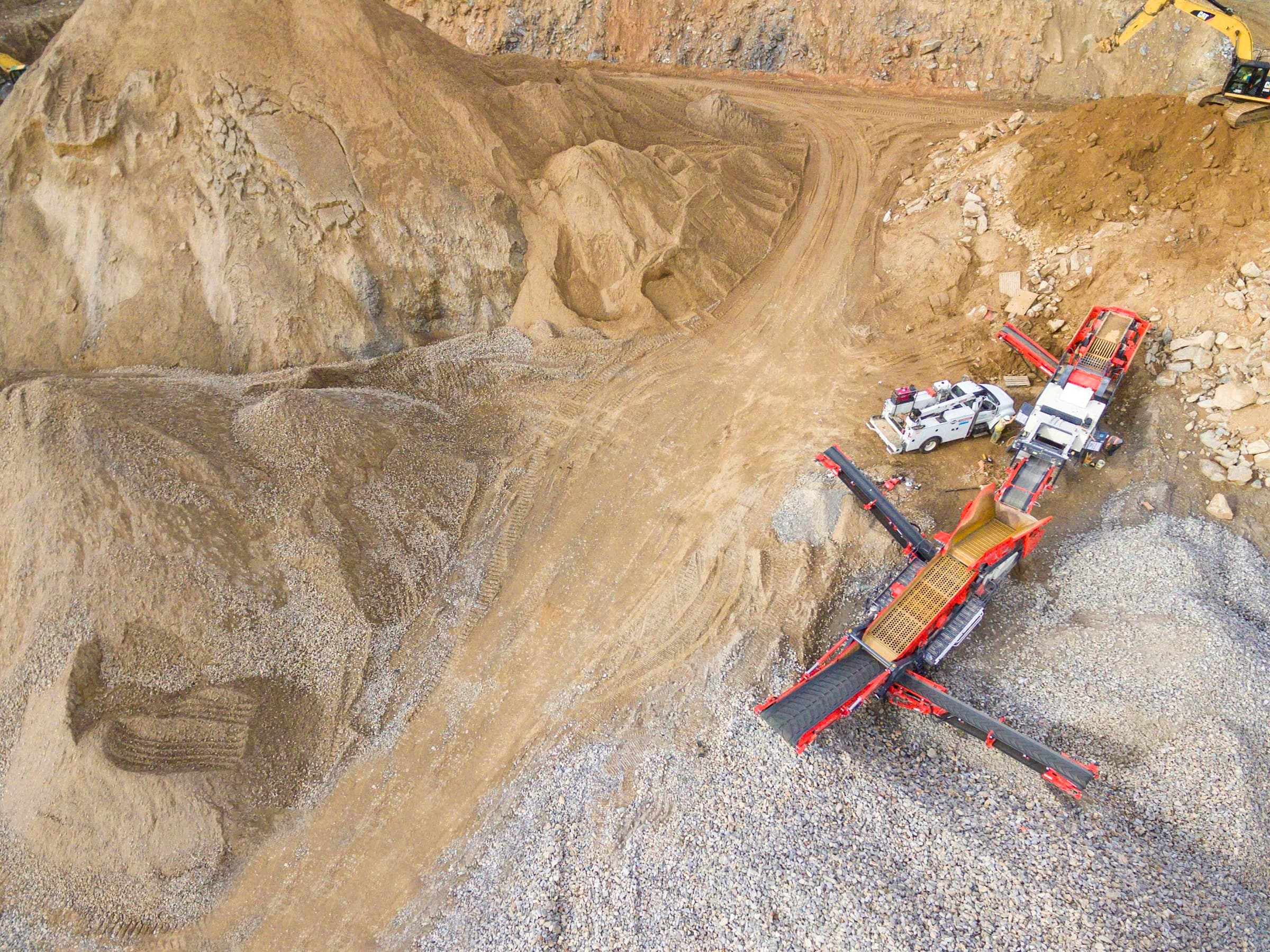 Heavy mineral sand stockpiled in bulk